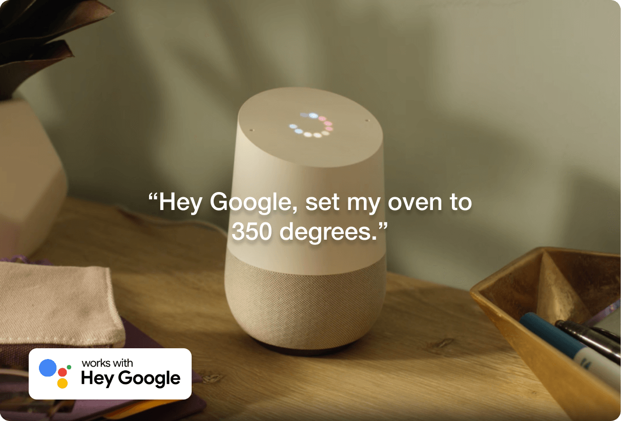 A Google Home responding to a command to heat an oven