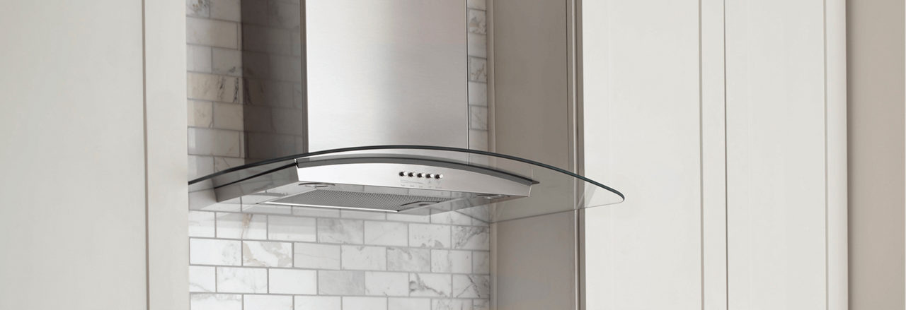 A Whirlpool® vent hood prominently displayed in a kitchen.