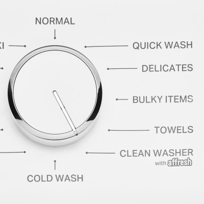 A washer control knob set to a self-clean setting