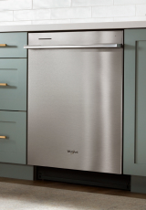 Top control dishwasher built into teal cabinets 