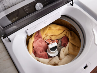 Clothes in a large capacity washing machine
