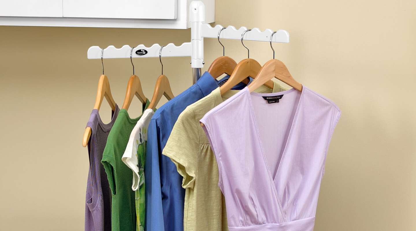 Clothing on hangers on a drying rack