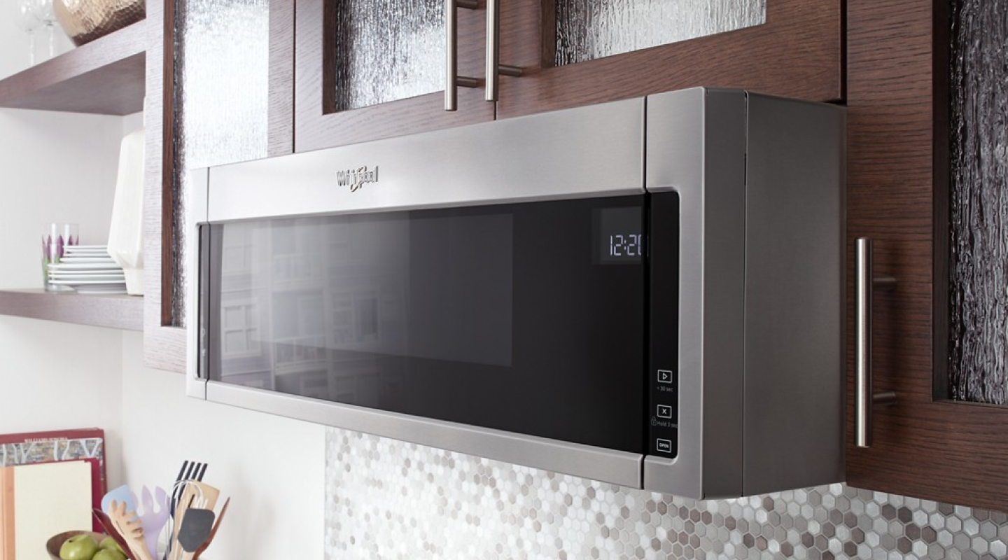 Whirlpool®  Low Profile Microwave in brown cabinetry