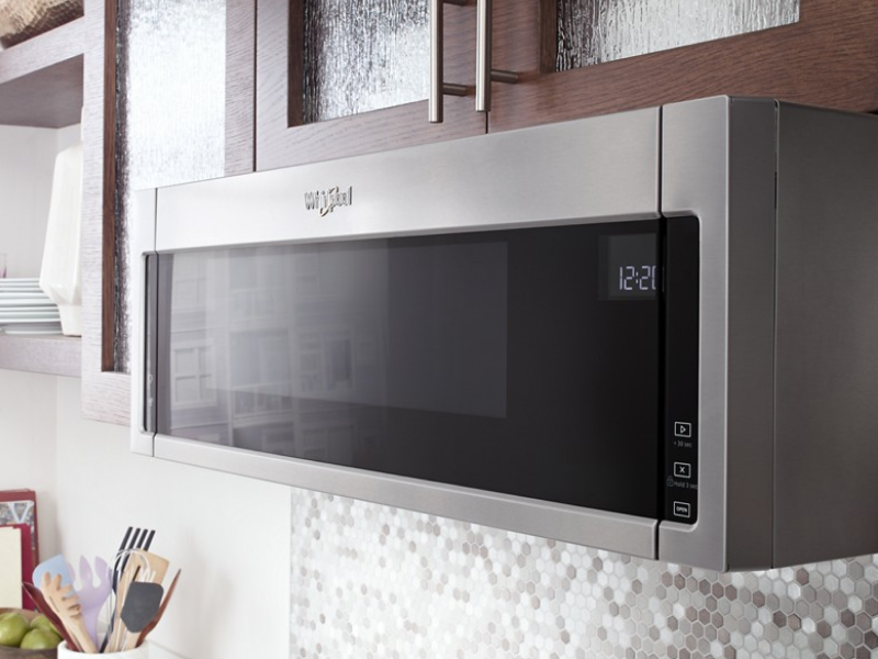 Whirlpool®  low profile microwave in brown cabinetry