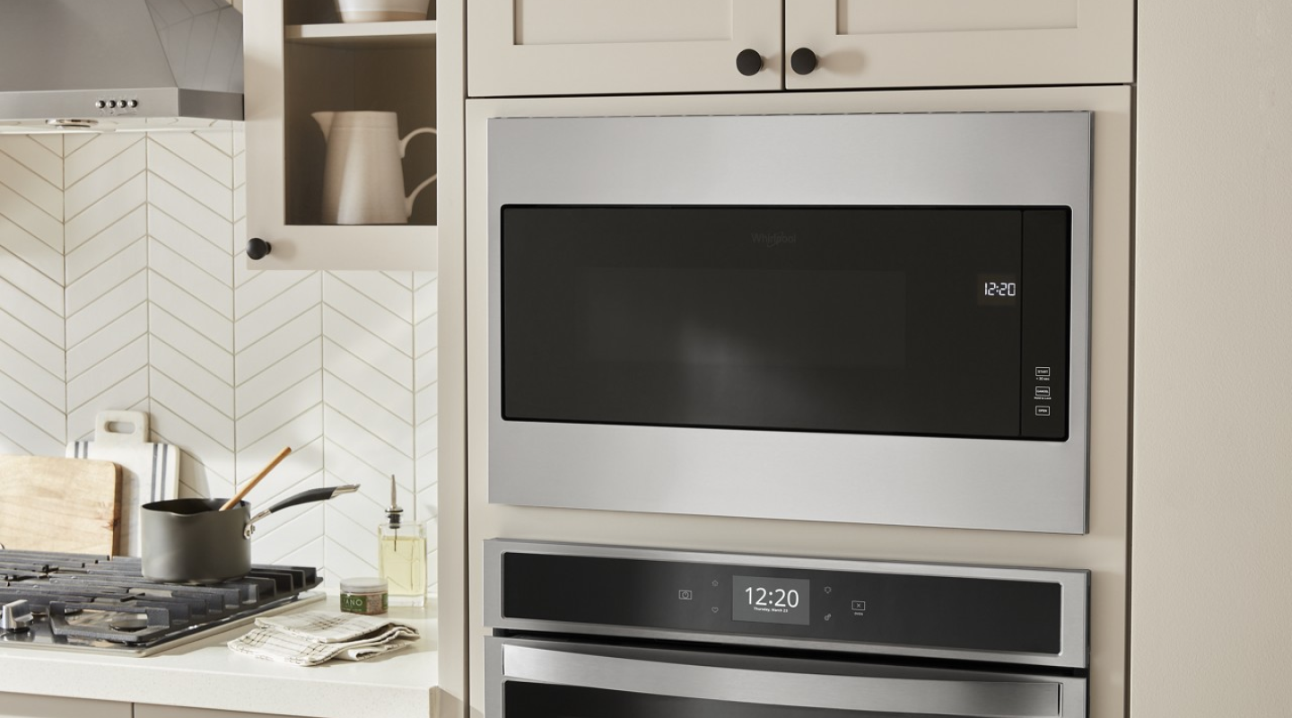 Built-in microwave in wall above built-in wall oven.