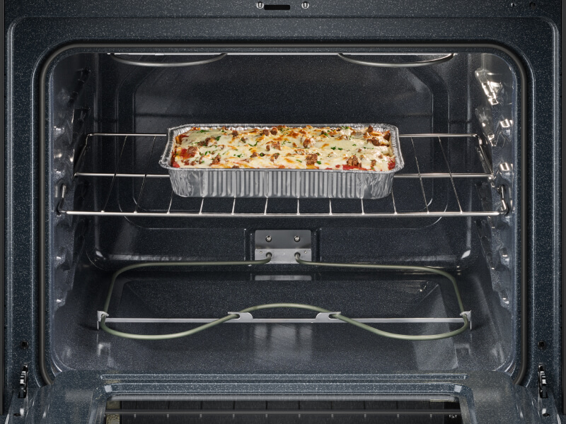 A Whirlpool® Oven with lasagna baking inside