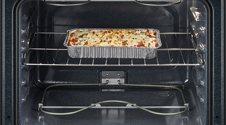 A Whirlpool® Oven with lasagna baking inside