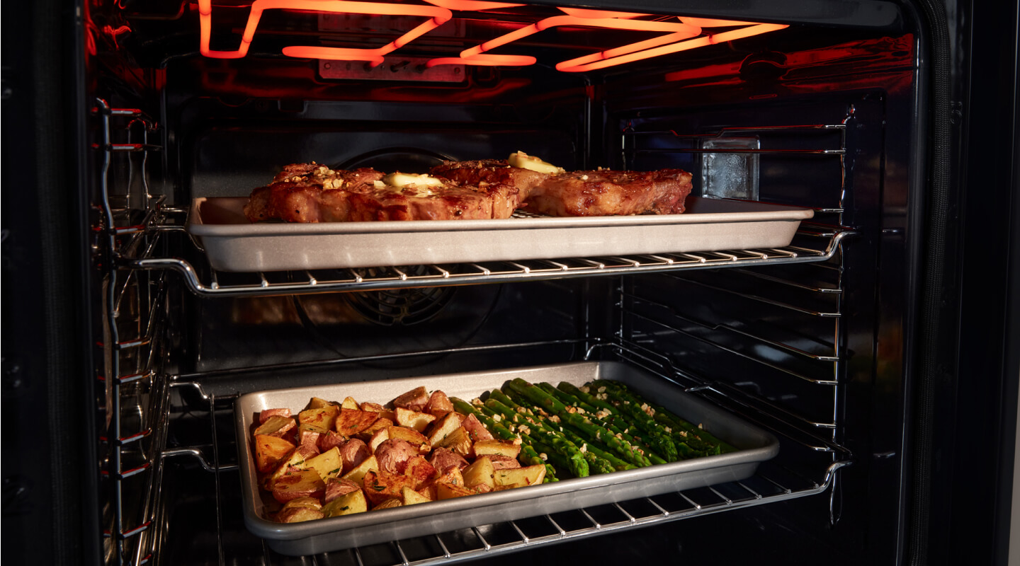  Inside of an oven with food cooking