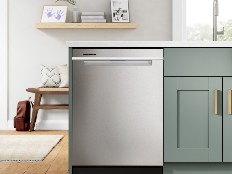 Whirlpool® dishwasher set in green cabinetry