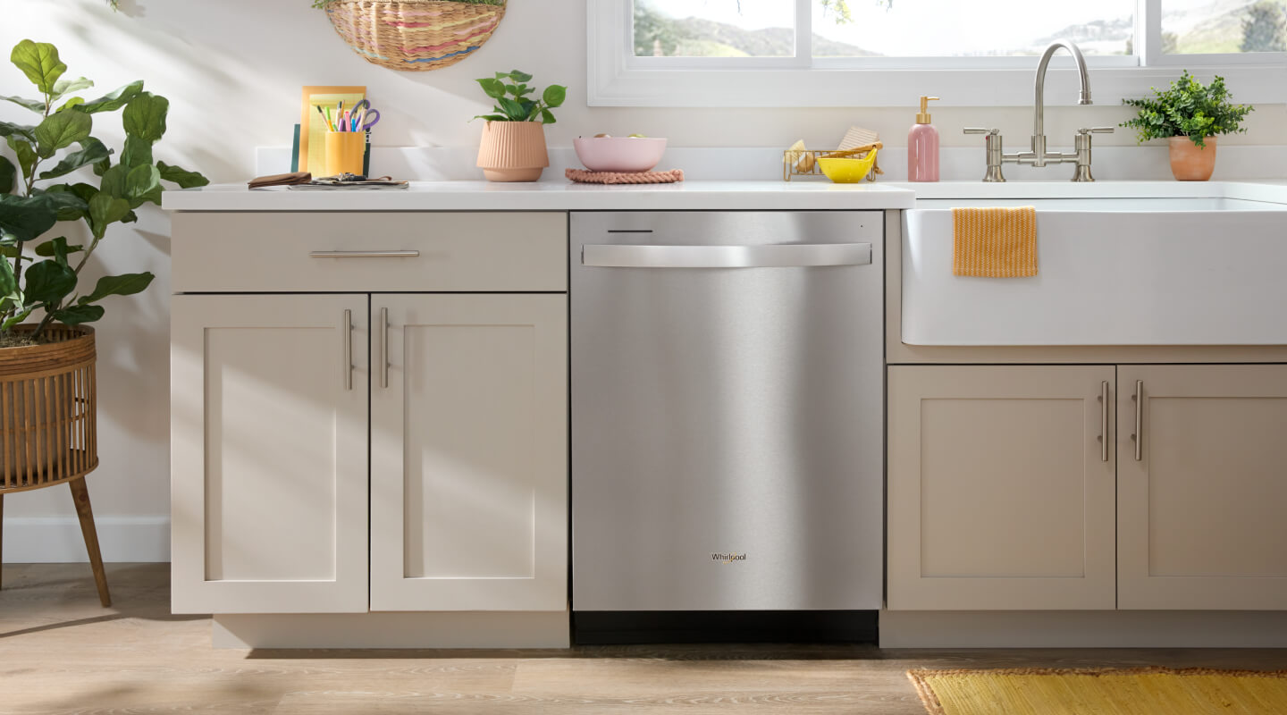 Stainless steel Whirlpool® Dishwasher in bright, modern cabinetry
