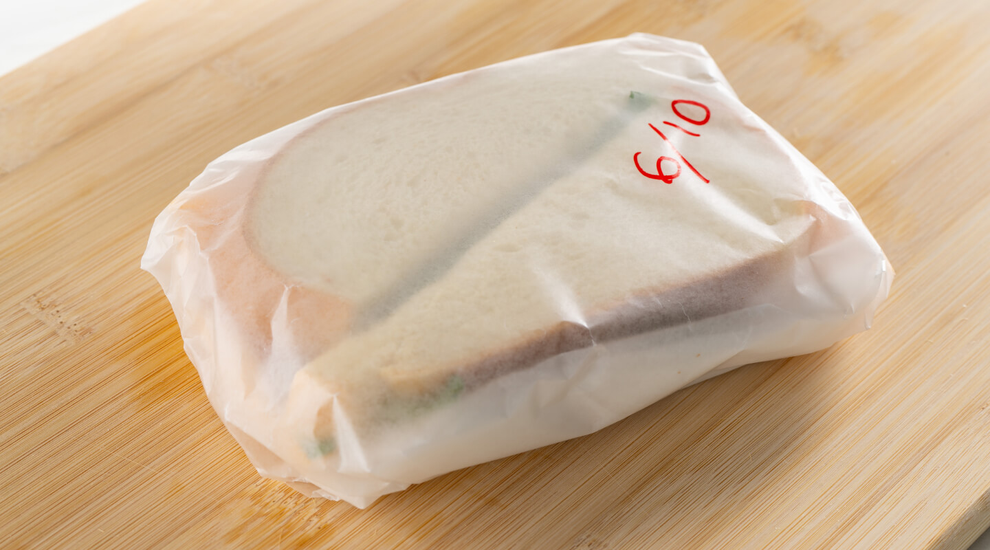 Sandwich wrapped with wax paper