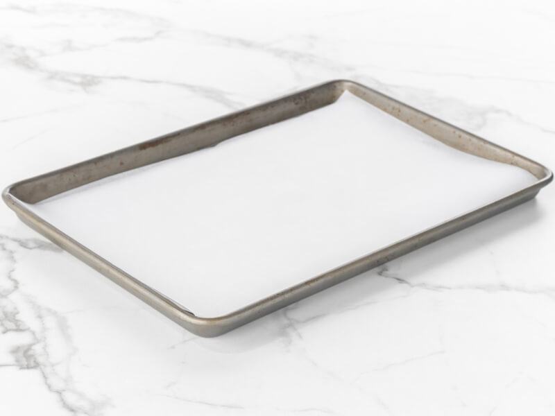 Baking sheet lined with parchment paper