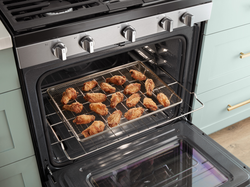 Chicken wings in an air fry basket