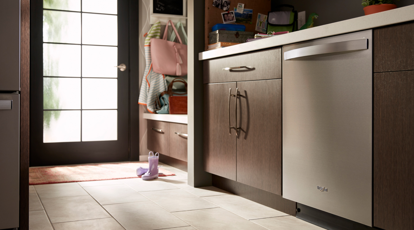 Stainless steel Whirlpool® dishwasher in a modern kitchen