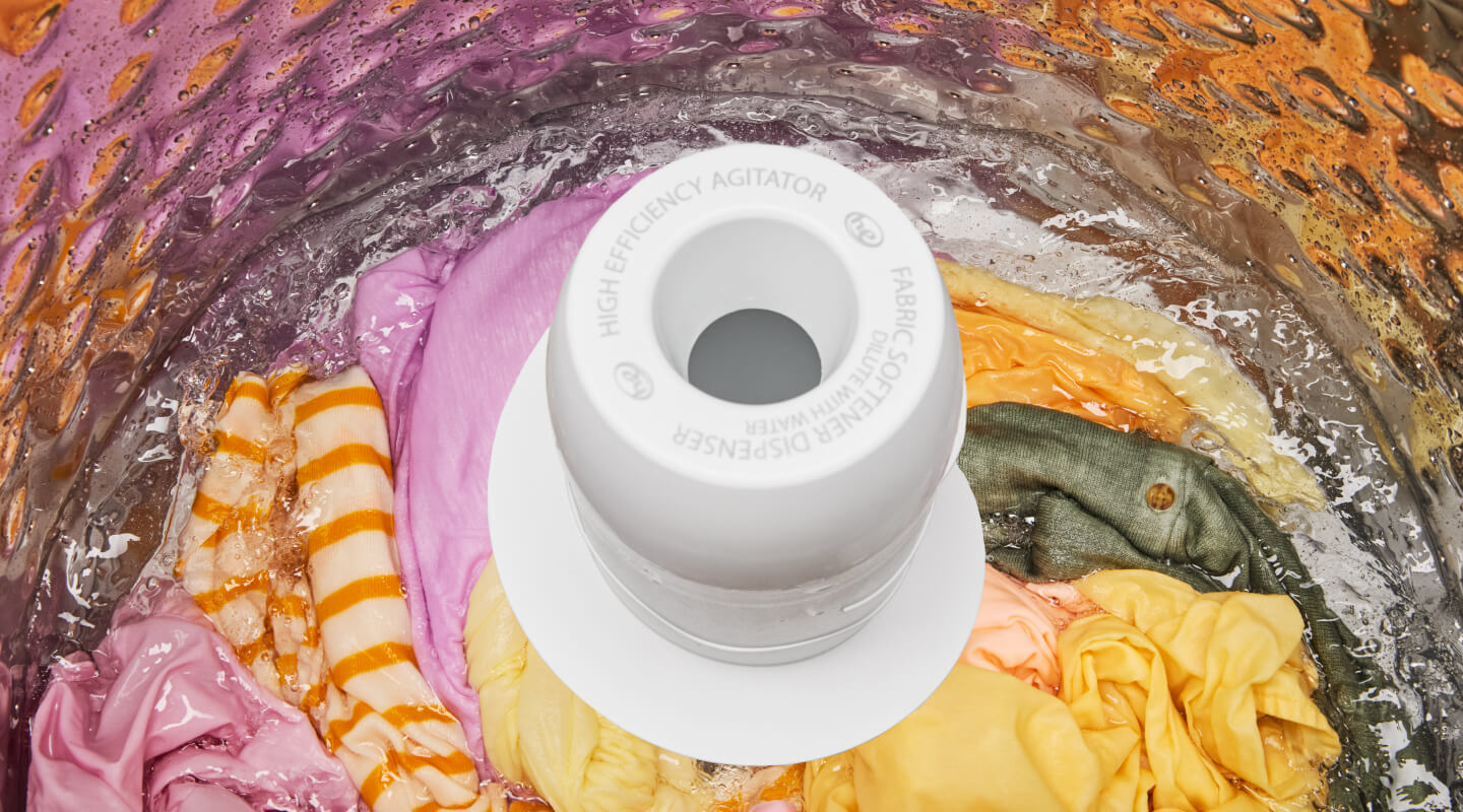 Clothes in a washer with an agitator