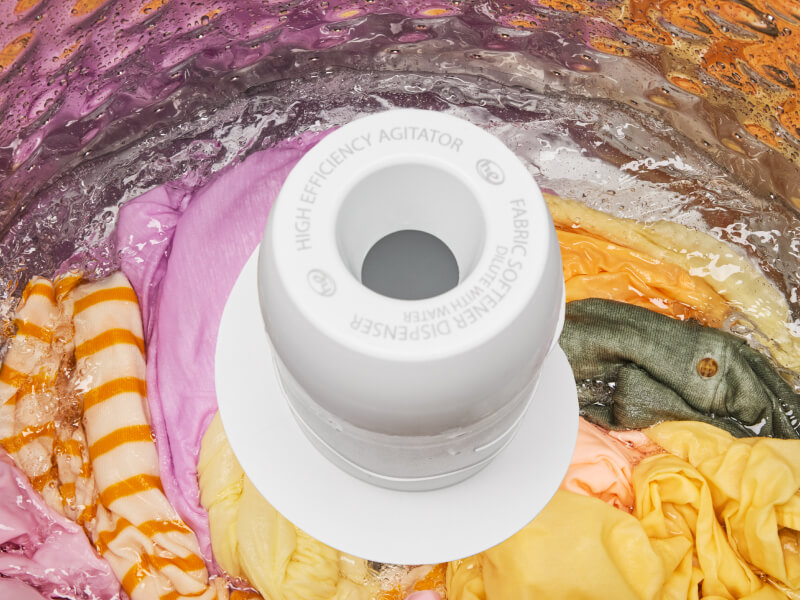 Clothes in a washer with an agitator