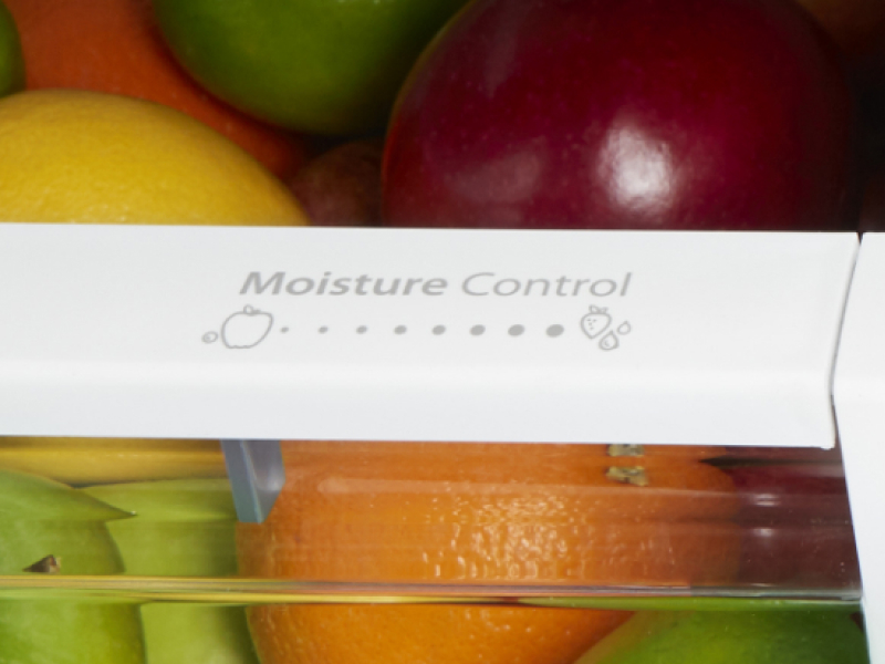 A humidity setting control on a crisper drawer