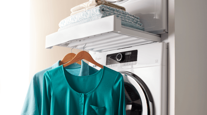 Clothing hanging from a washing machine