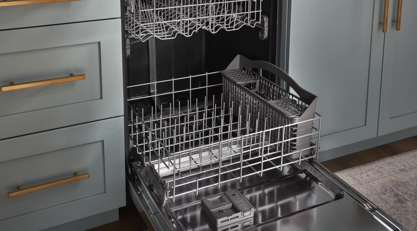 Dishwasher open to show racks