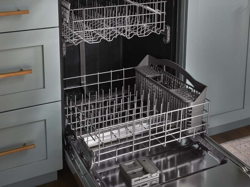 Dishwasher open to show racks