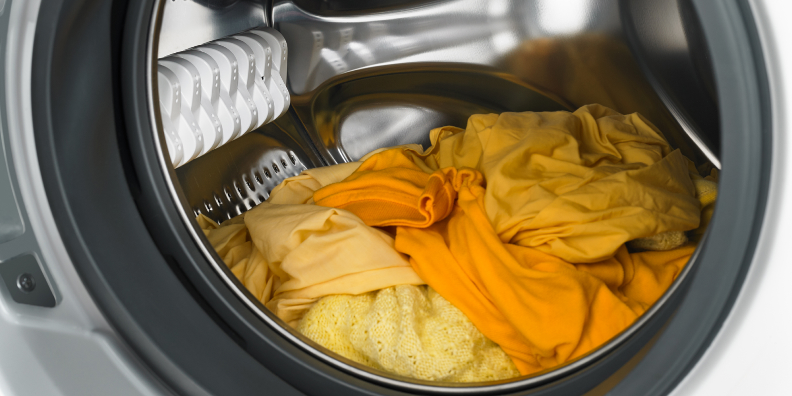 Dryer open with clothes inside