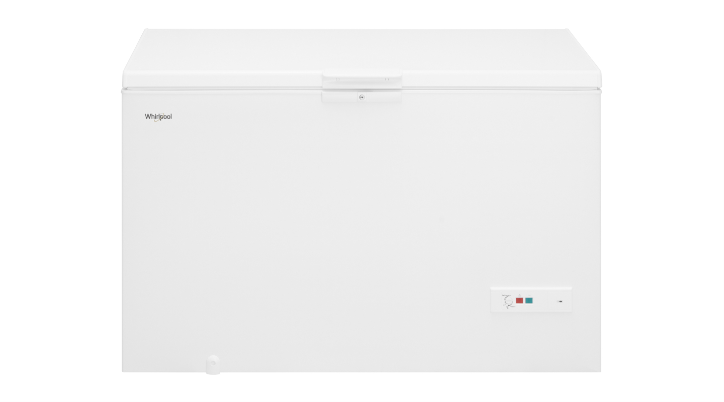 A white chest freezer against a white background