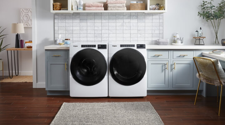 Front load washer and dryer in a utility room