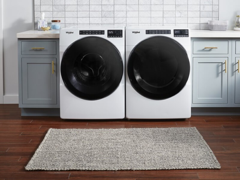 Front load washer and dryer in a utility room