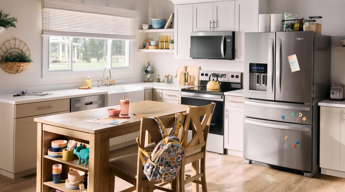 A bright kitchen with stainless steel Whirlpool® Appliances