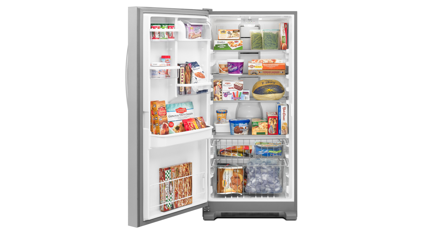 Upright freezer opened to show contents
