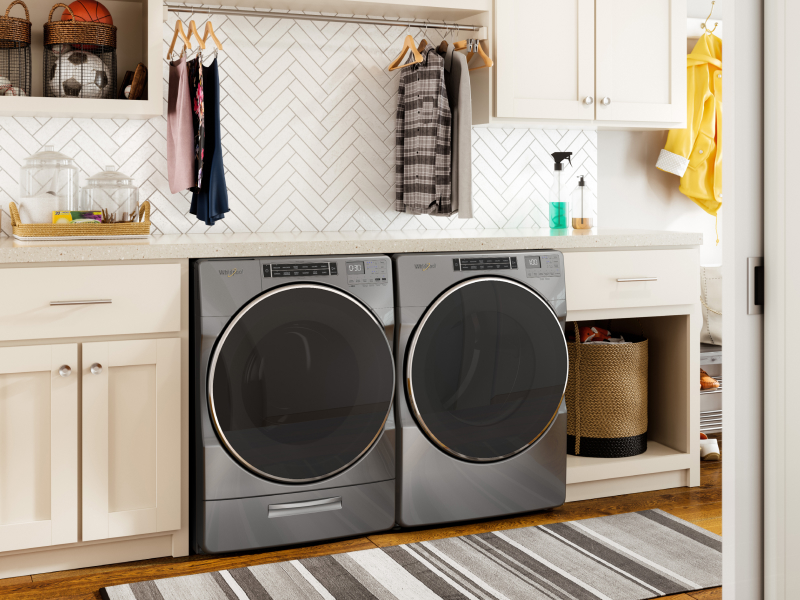 Stainless steel Whirlpool® washer and dryer set in laundry room