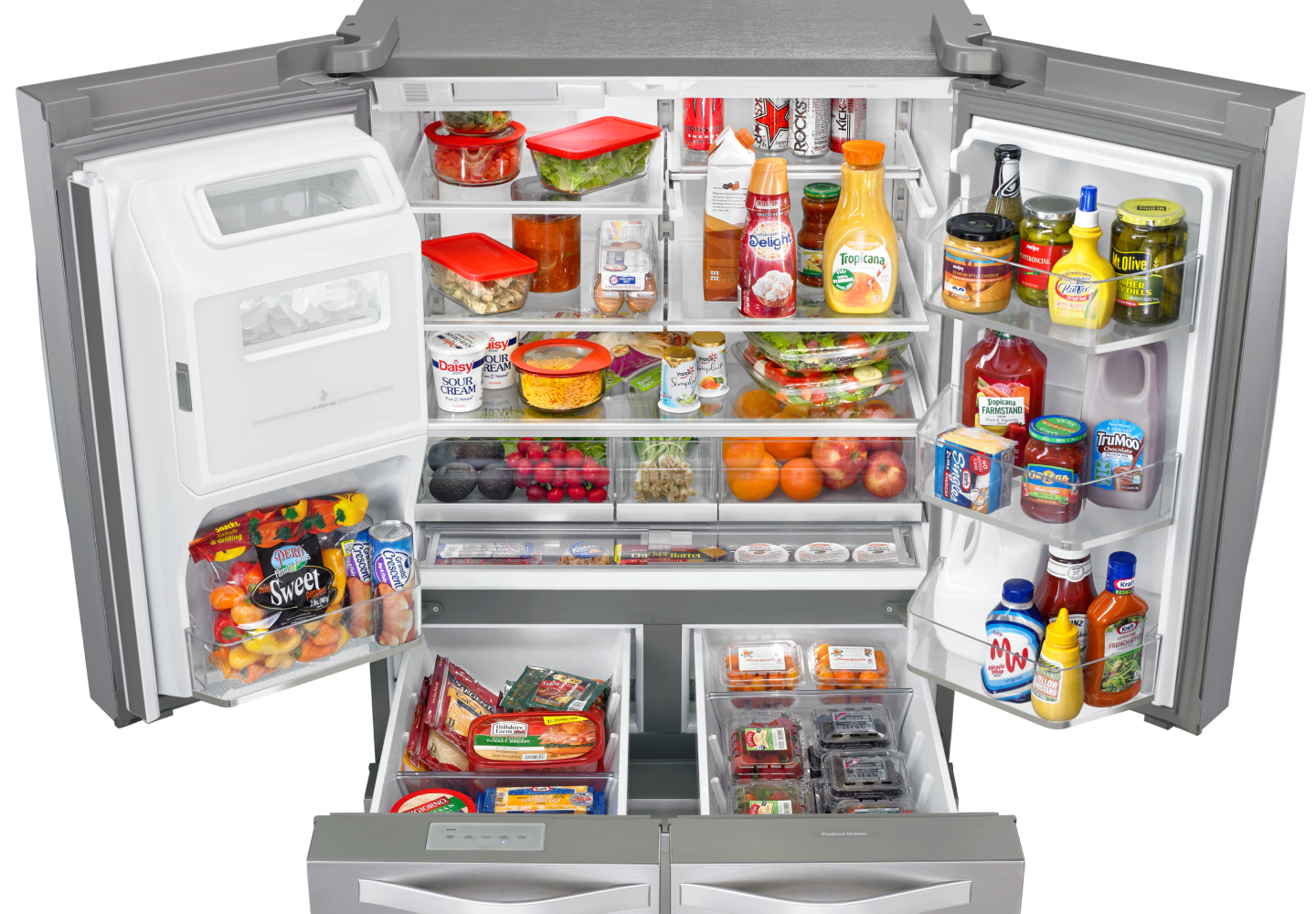 Refrigerator with drawers and doors open, full of food and condiments