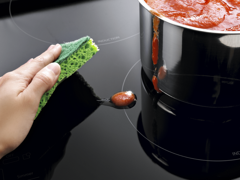 Removing spills from the stove top