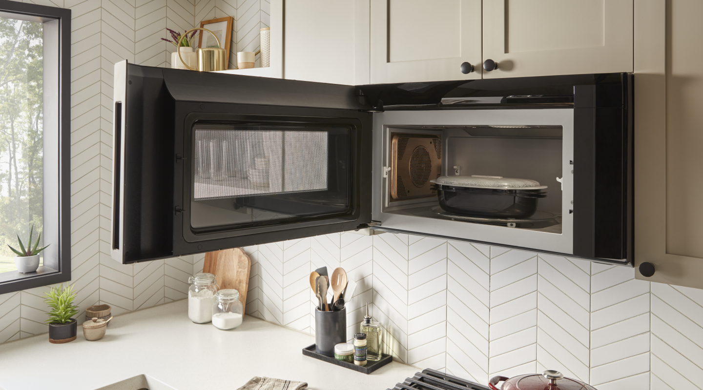 Microwave-safe container in an open over-the-range microwave