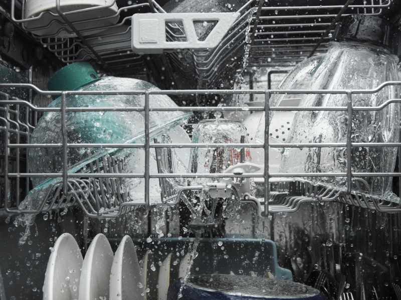 Dishes in the middle of a dishwasher cycle