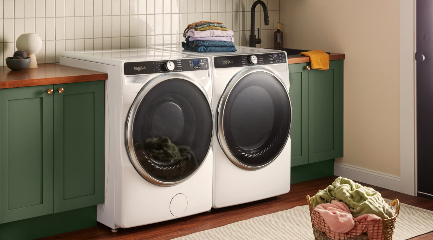 A Whirlpool® Washer and Dryer pair in a laundry room