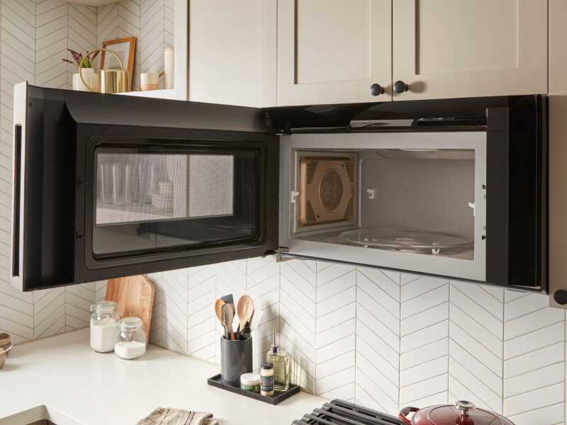 Over-the-range microwave with an open door