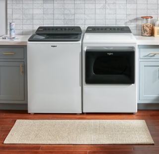 A white Whirlpool®. Washer and Dryer