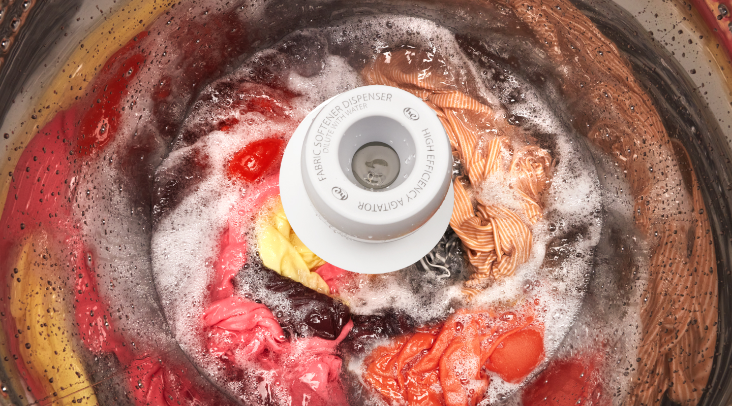 Laundry lathering in detergent in a top-load washing machine