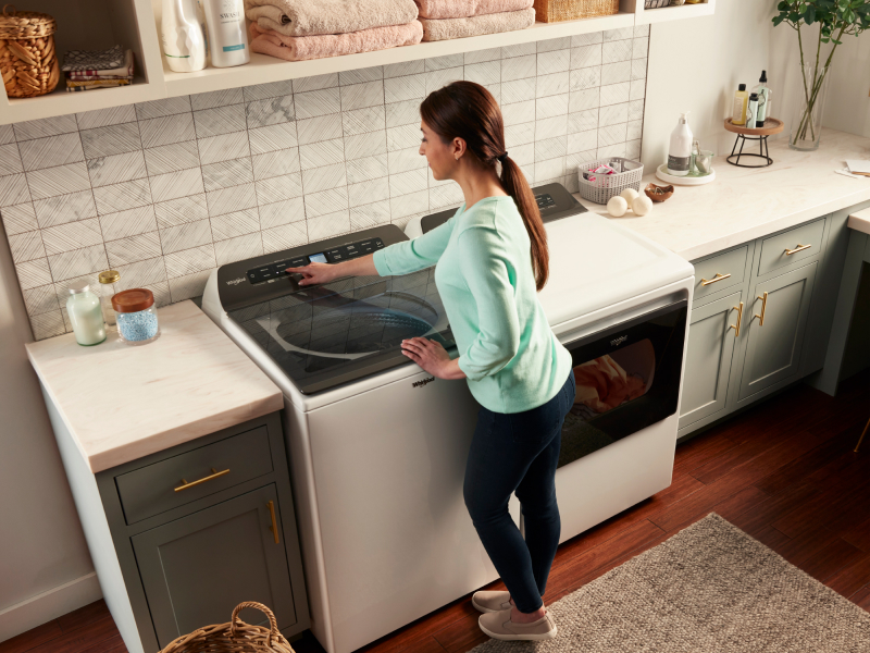 Person changing washer settings
