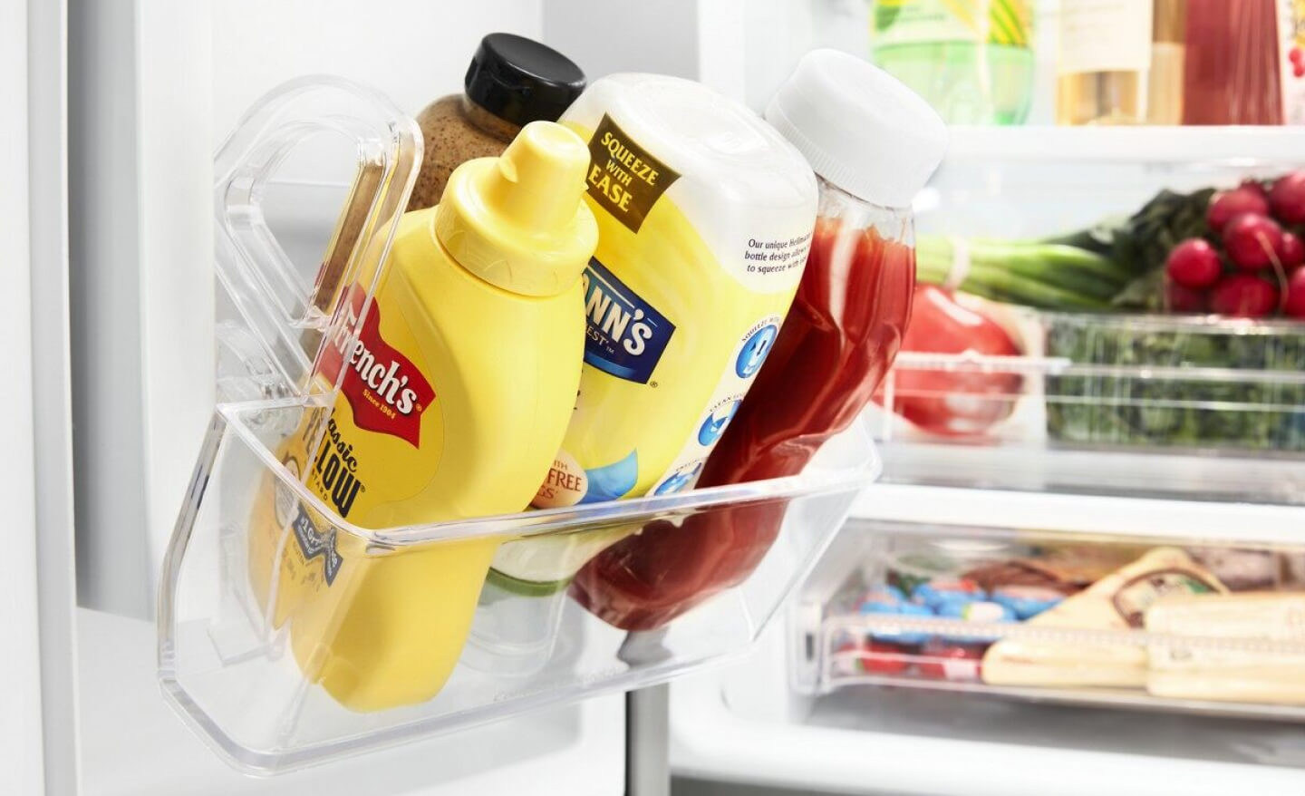 Close up of refrigerator door compartment