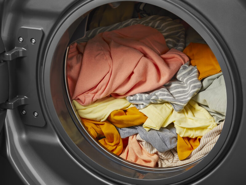 A washer filled with clothes