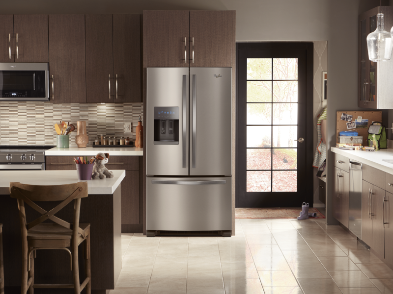 Stainless steel Whirlpool® French door refrigerator in a modern kitchen