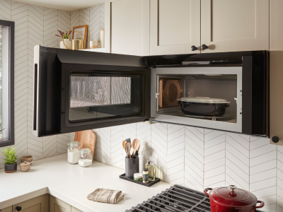 Food in an over-the-range microwave with the door open