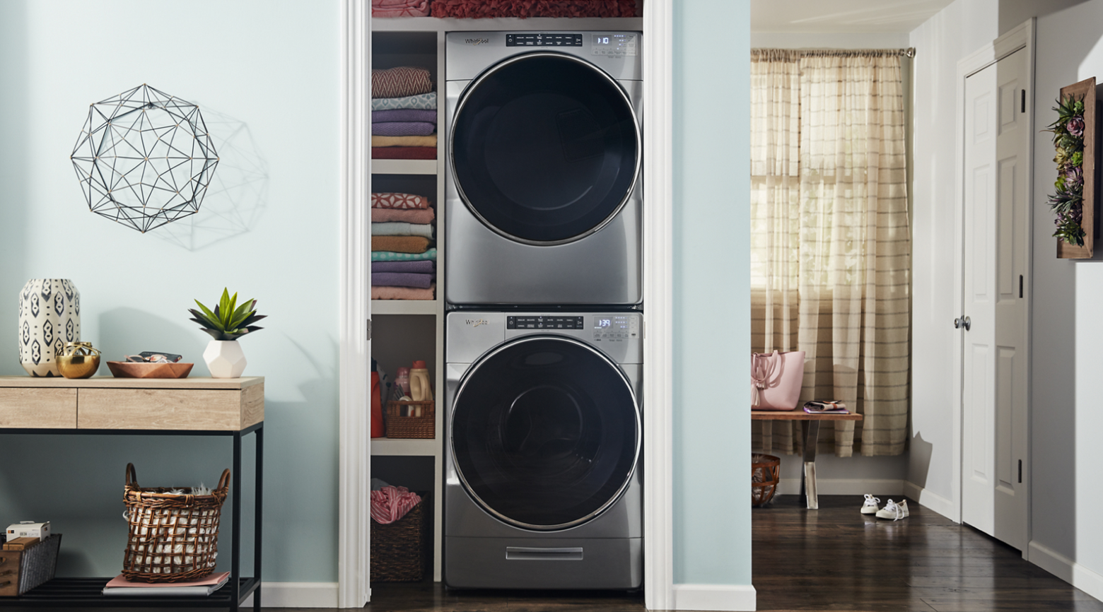 Stacked washer and dryer in a closet 