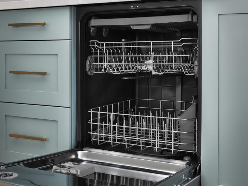 An empty, open dishwasher