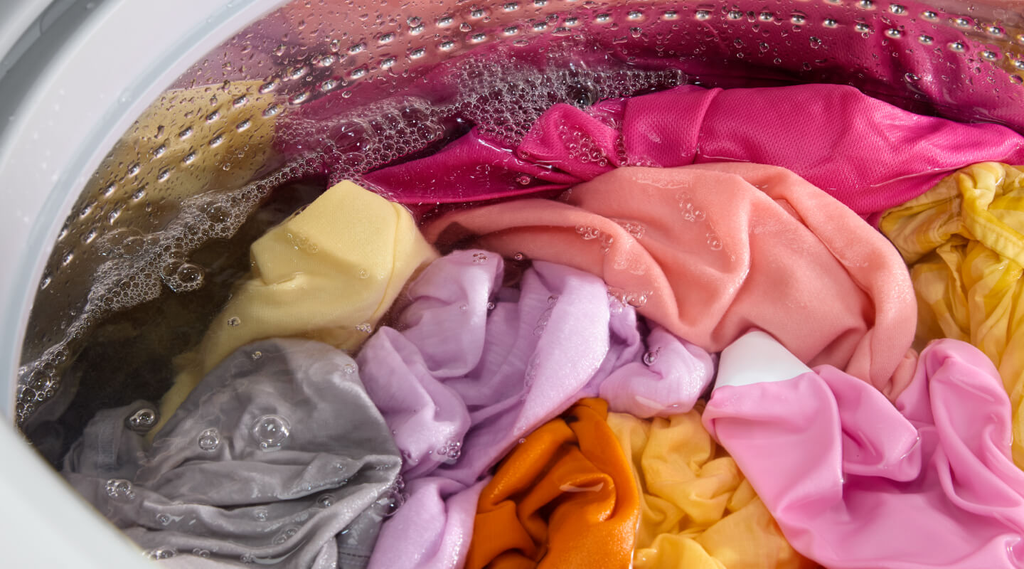 Brightly colored clothing in a washing machine