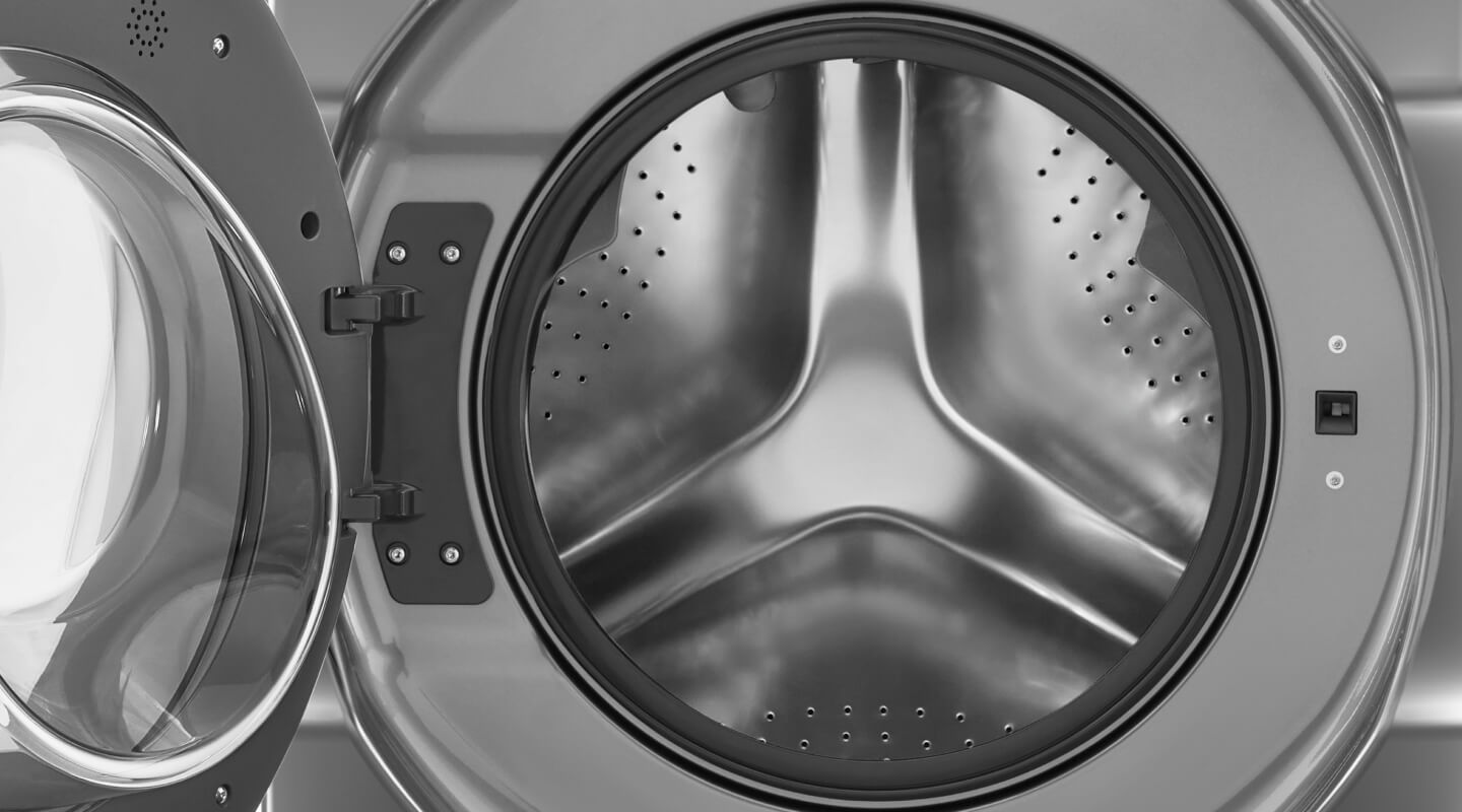 A Whirlpool® dryer with an open door