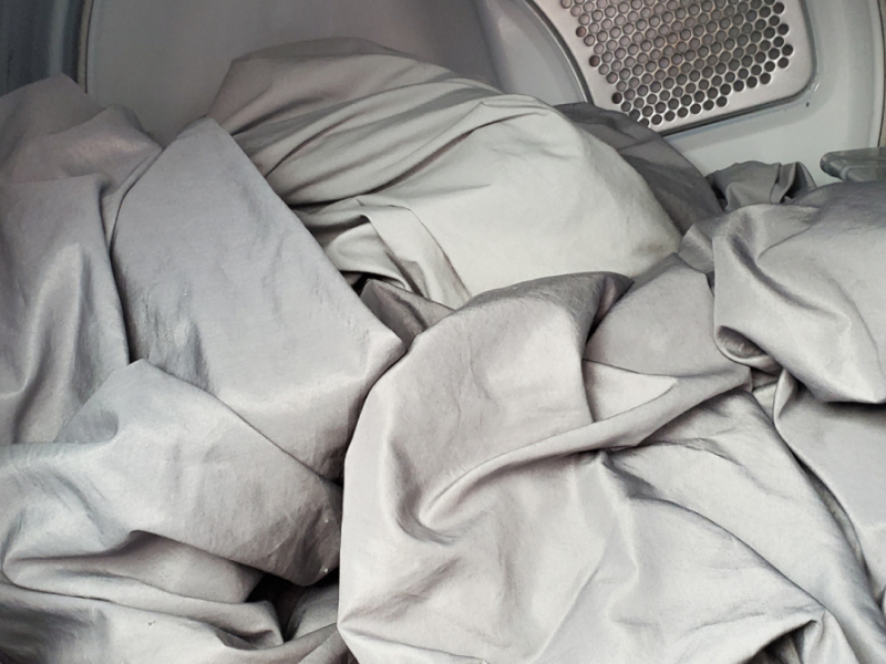 Interior of Whirlpool® dryer with sheets