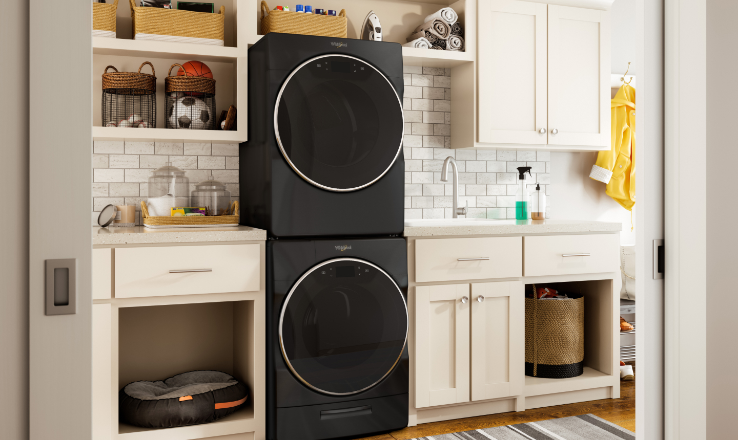 Stacked black Whirlpool® washer and dryer